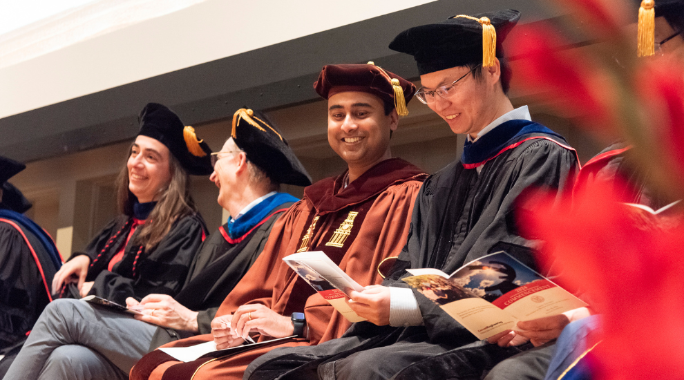 faculty dressed in regalia during commencement 