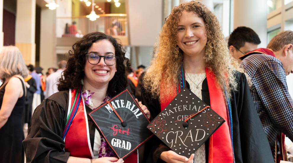 student and faculty members dressed in regalia during commencement