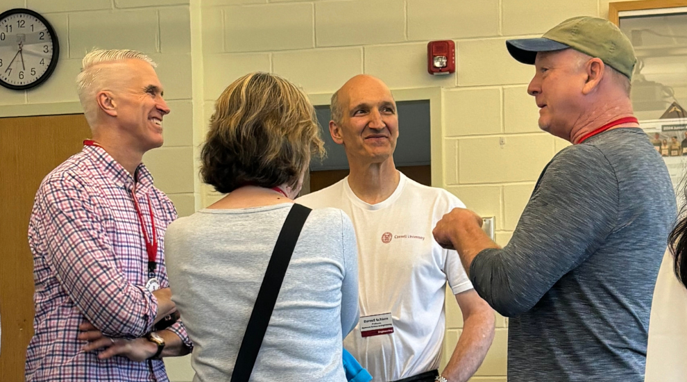 faculty and alumni talking during reunion weekend